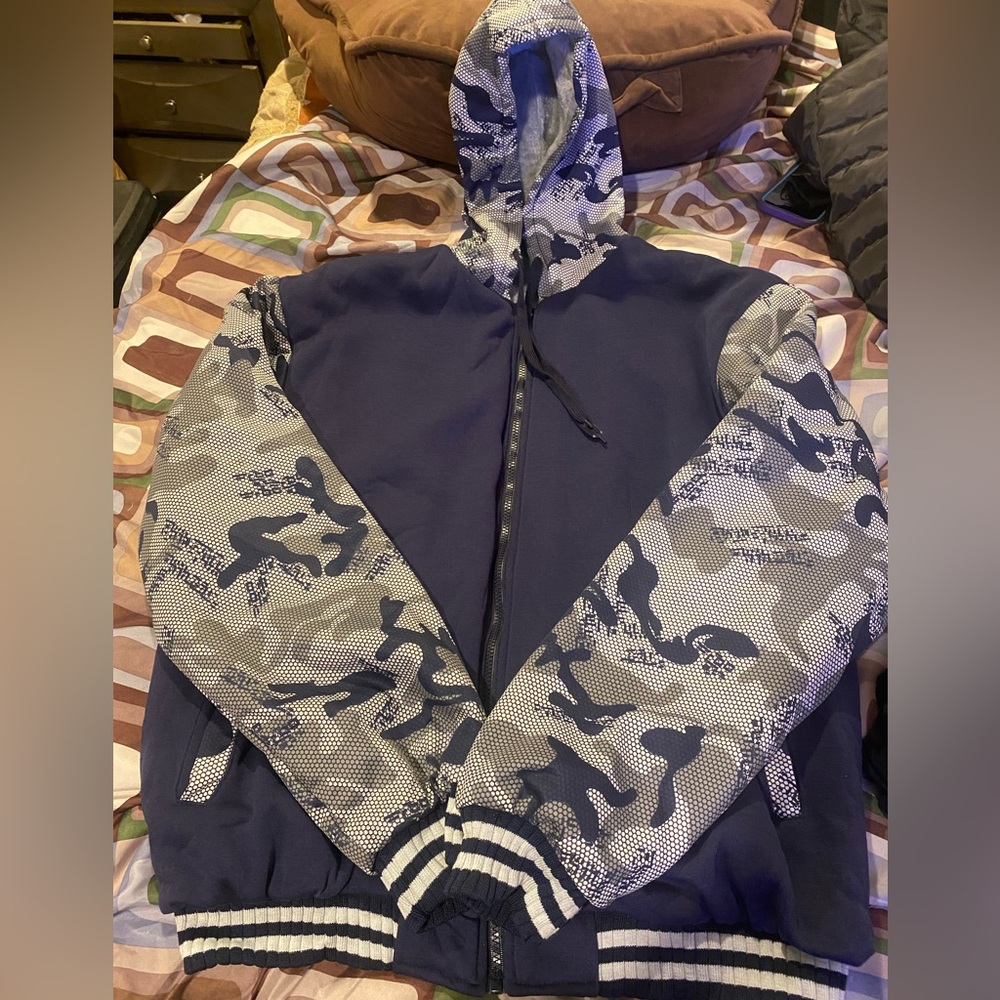 Men’s blue, gray and white zip up sweater
